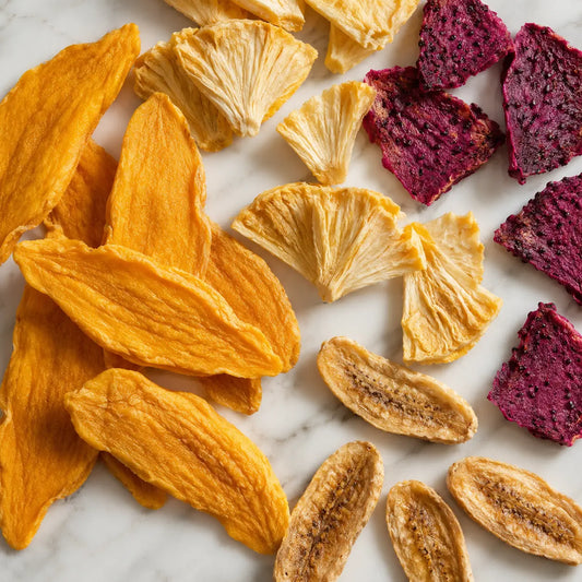 Assorted no sugar added dried tropical fruits from Thailand — mango, pineapple, dragon fruit and banana by KP Fruits